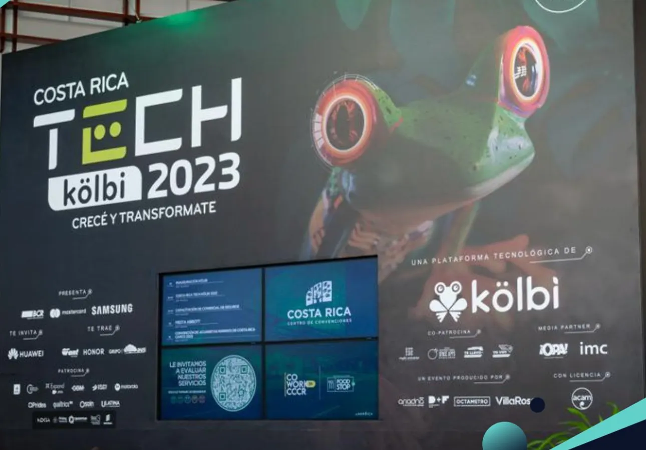 Costa Rica Tech kölbi 2023 — muro principal con los créditos de producción (D+F, Ariadna, OCTAMETRO, VillaRoss)